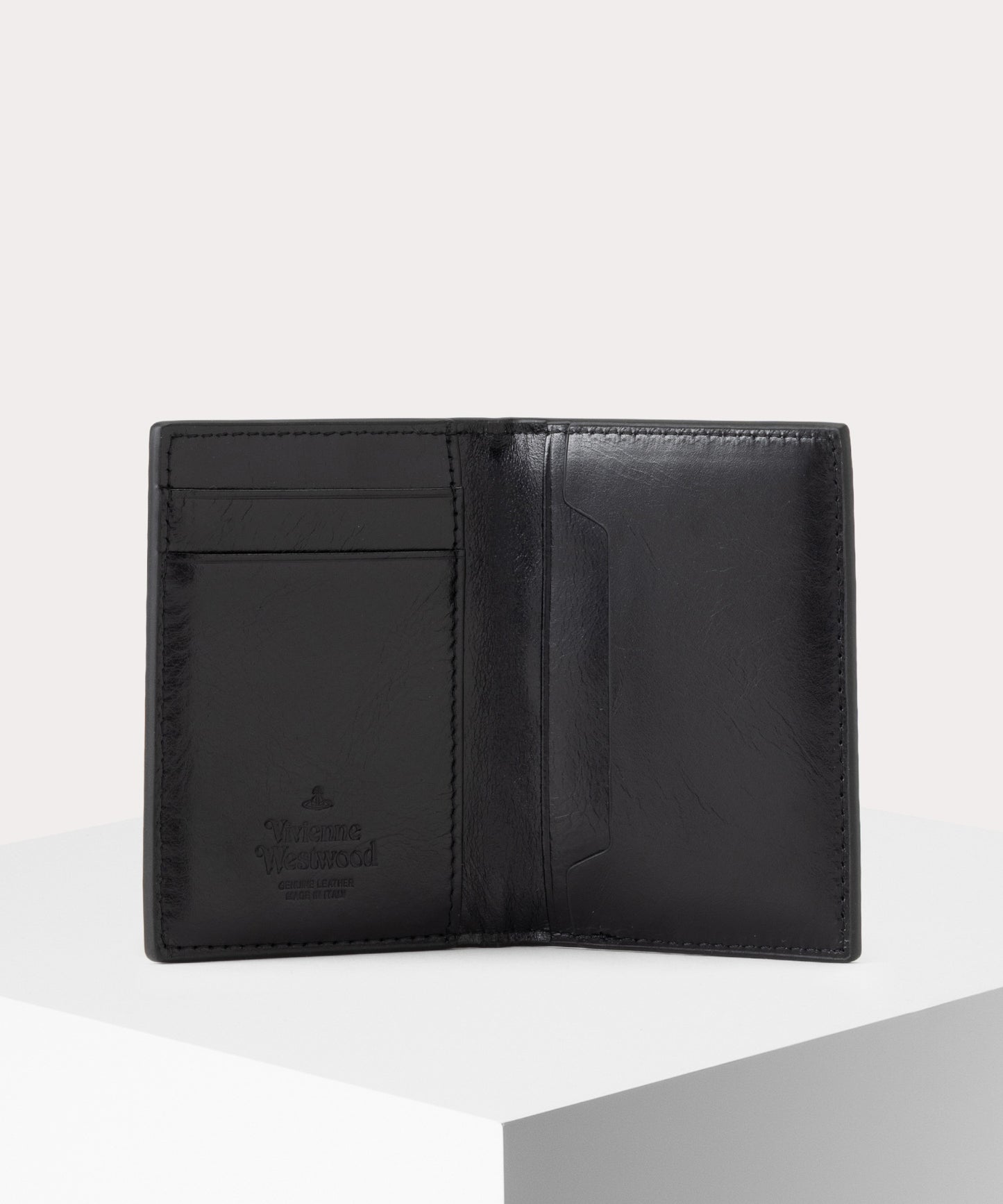 DINO EMBOSSED 縦型ミニ財布