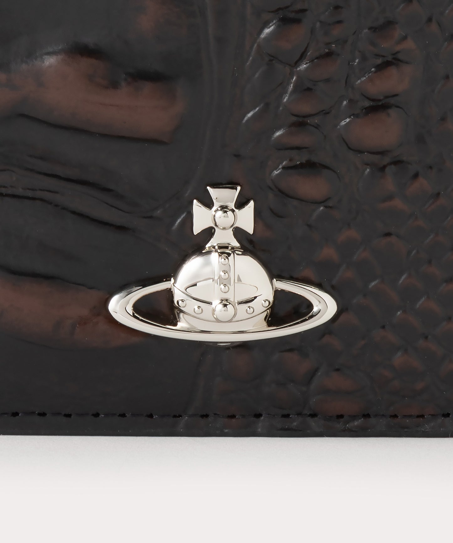 DINO EMBOSSED 縦型ミニ財布