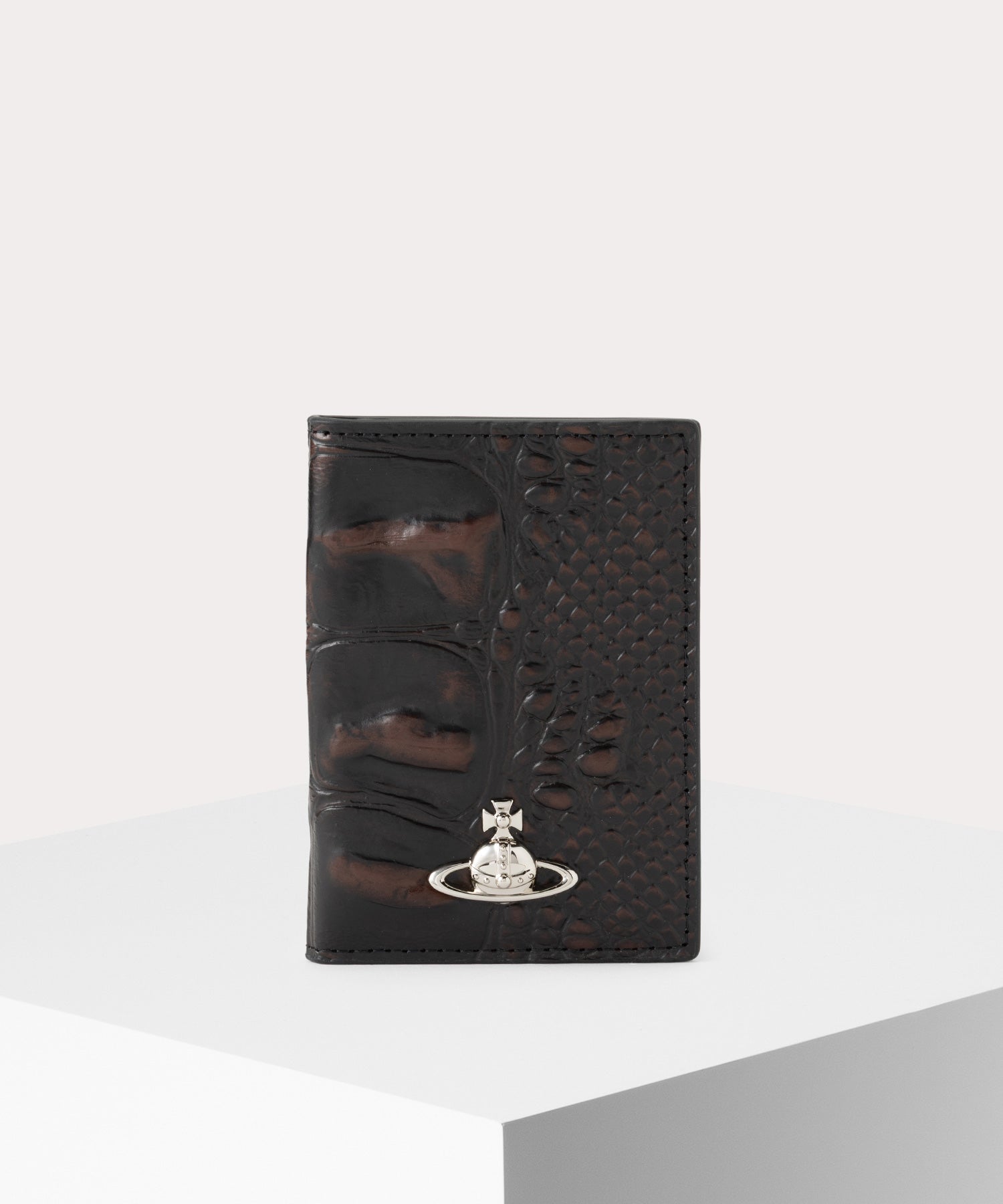 DINO EMBOSSED 縦型ミニ財布